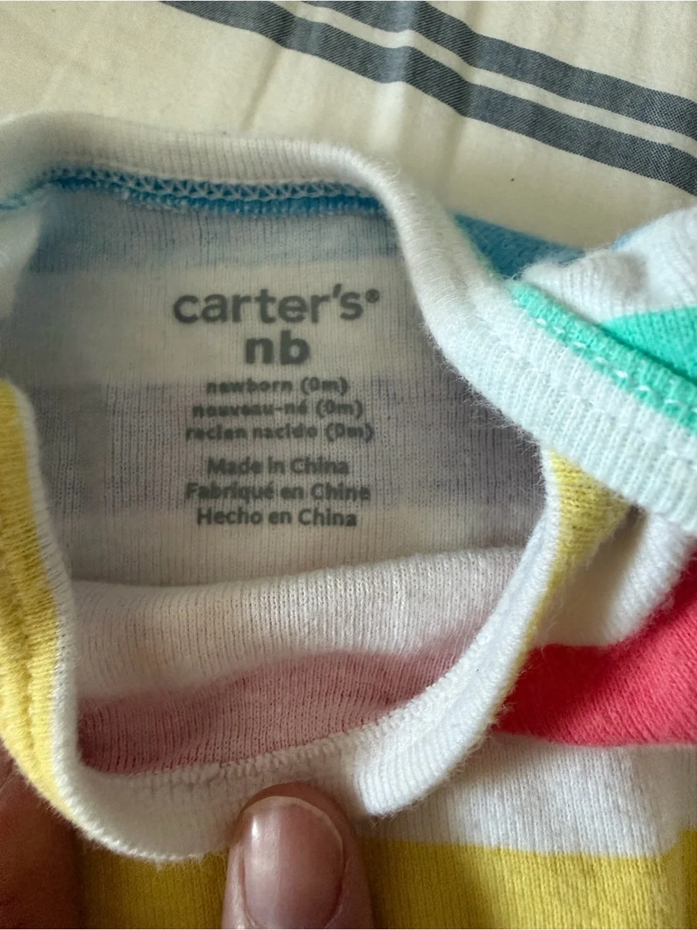 4 Carter's NB Onesies - Rainbow Stripe, blue stripe and White Cloud Prints